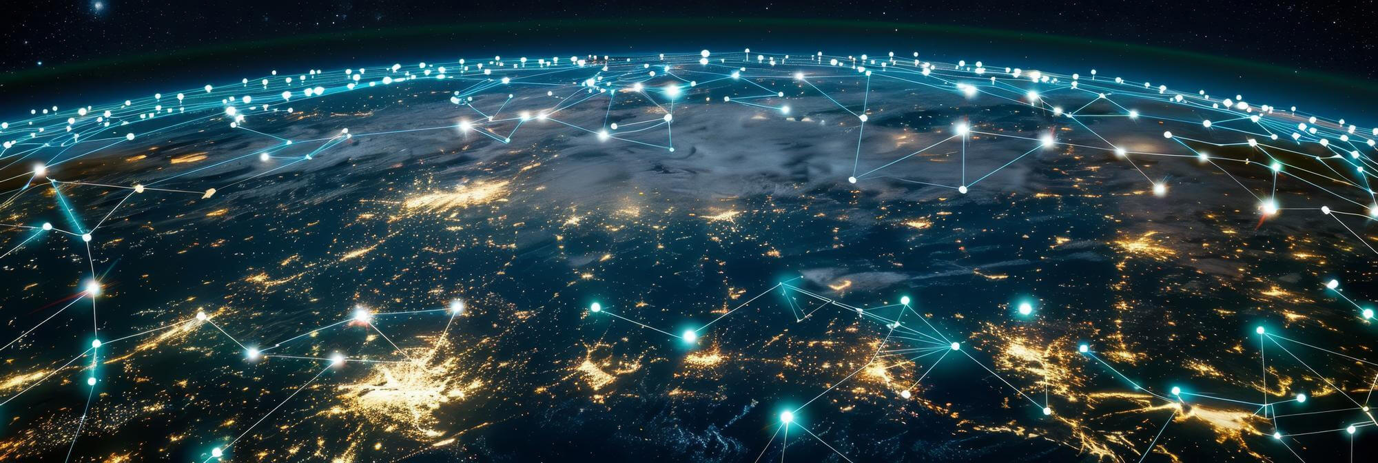 Aerial view of Earth at night with illuminated cities connected by glowing lines, representing a global digital network.