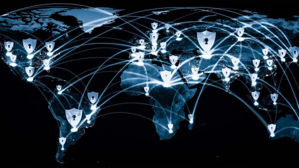 World map with glowing network lines connecting locks on shields, symbolizing global cybersecurity.